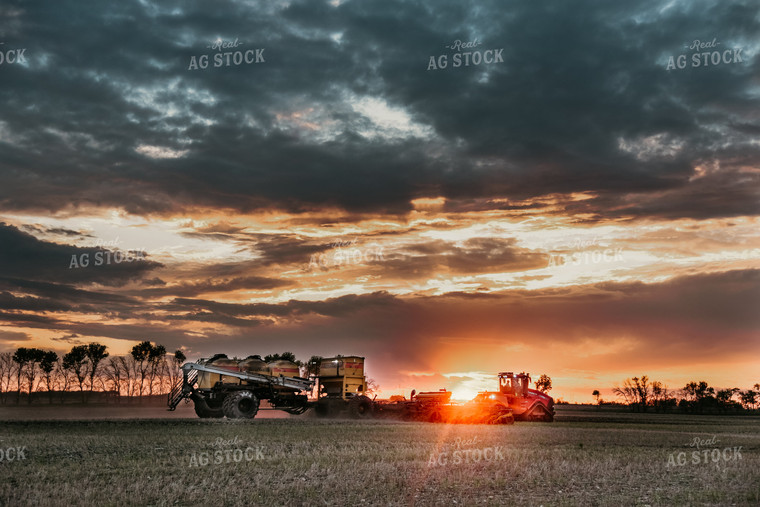 Air Seeder Planting Field at Sunset 64274