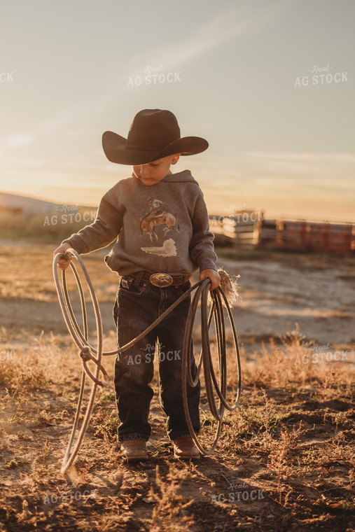 Farm Kid Holding Rope 61126