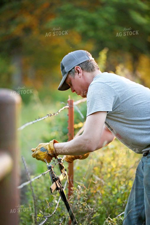 Farmer Trimming Fence 127011