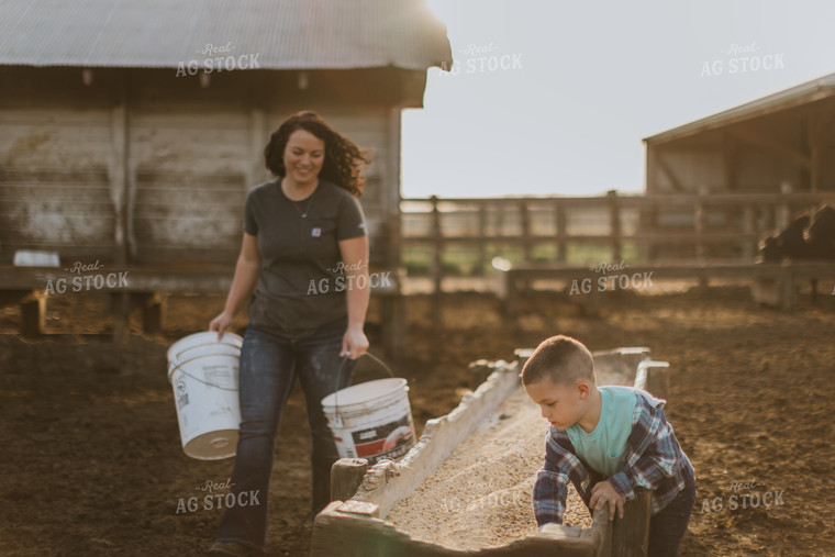 Farmer and Farm Kid Doing Chores 7407