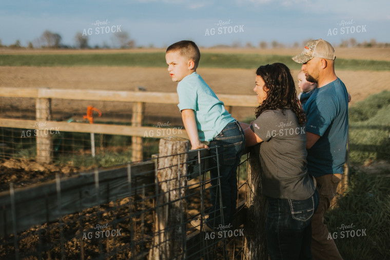 Farm Family Standing at Fence 7413