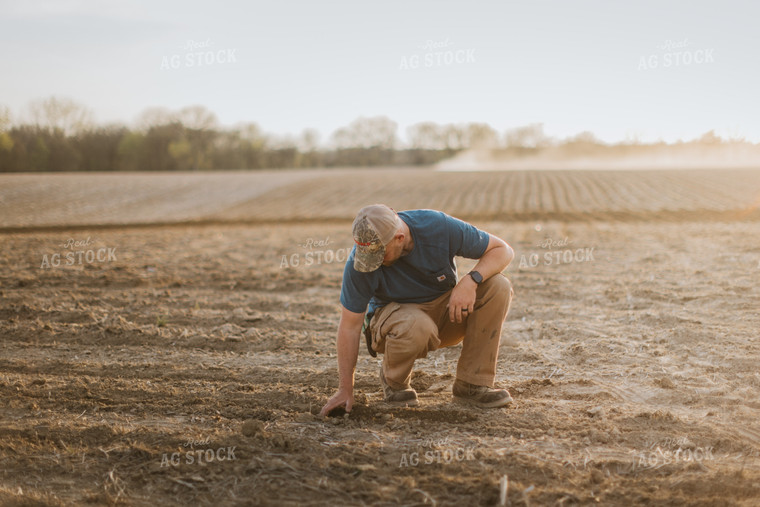 Farmer Touching Soil 7428