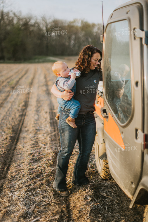 Farmer and Farm Kid Getting in Side by Side 7440