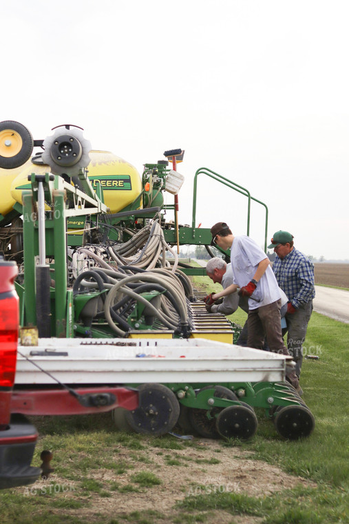 Farmers Working on Planter 109073