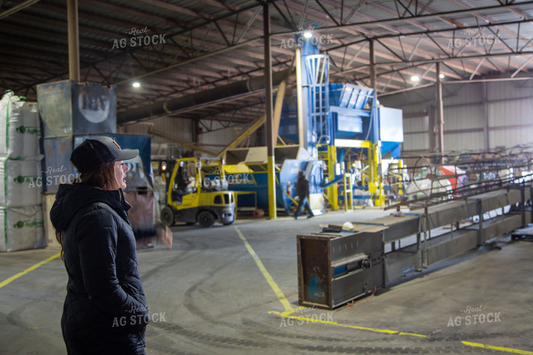 Farmer Standing in Shed 130012