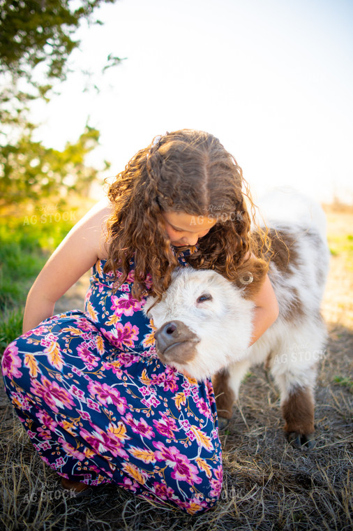 Farm Kid Hugging Calf 56580