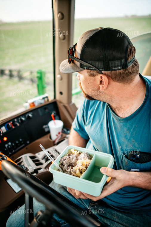 Farmer Eating a Meal in Sprayer 56608