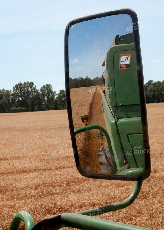 Combine Reflection in Mirror during Wheat Harvest 132017