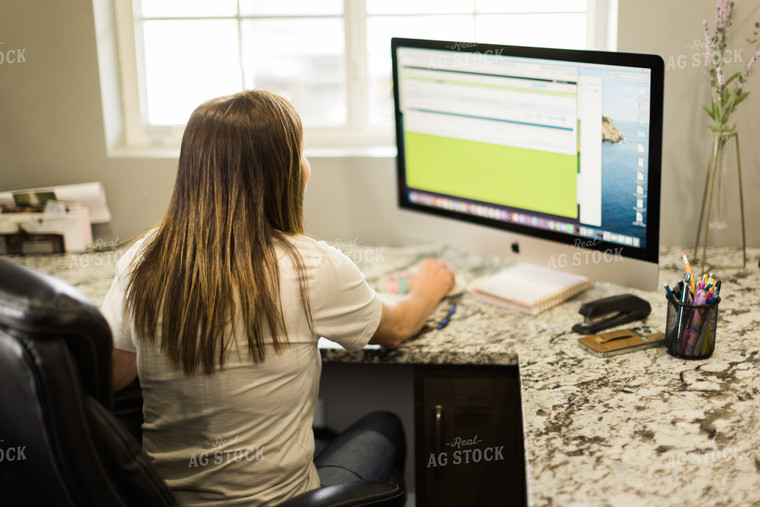 Woman Farmer Works on Computer in Office 7505