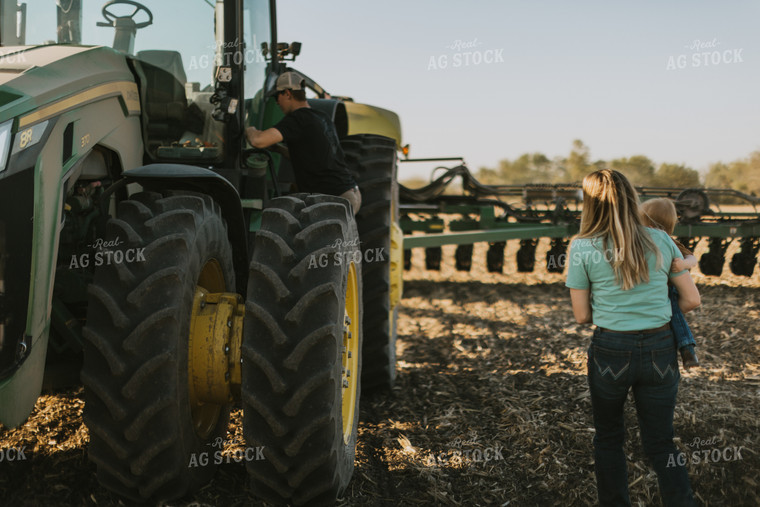 Young Couple with Child Walk Toward Tractor 7656