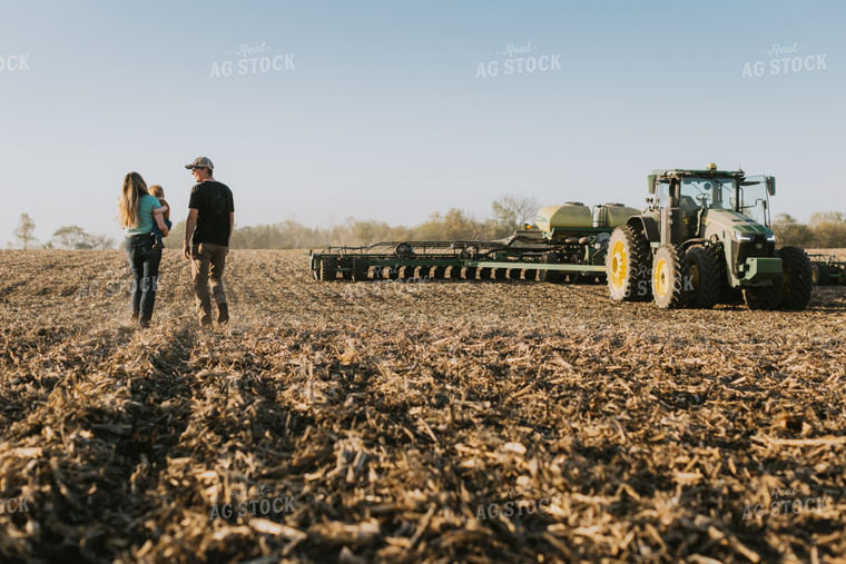 Young Couple with Child Walk Toward Tractor 7675