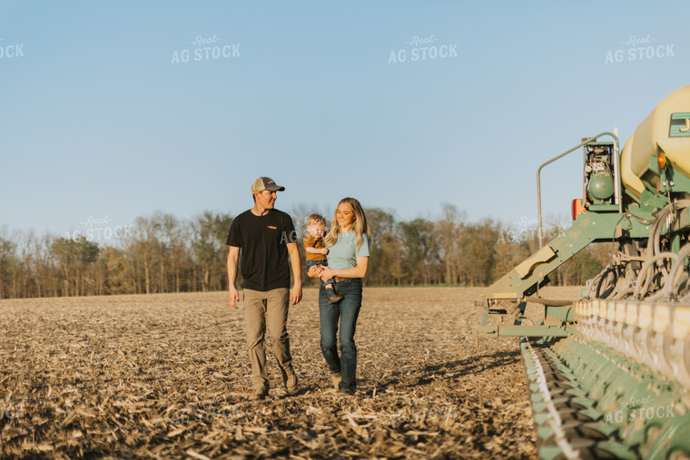 Young Couple with Child Walk Along Planter 7684