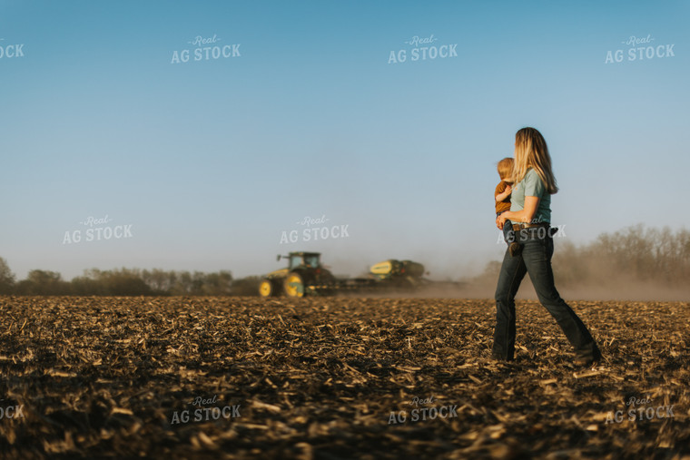 Farm Wife and Child Watch Tractor Plant 7689