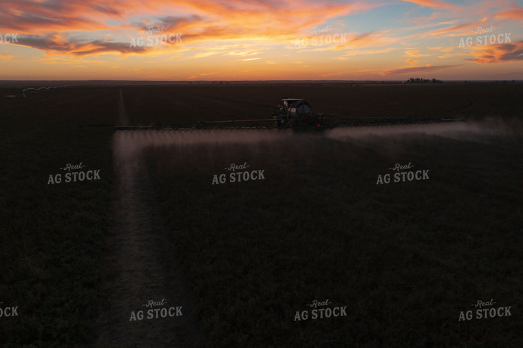 Spraying Field at Sunset 135000