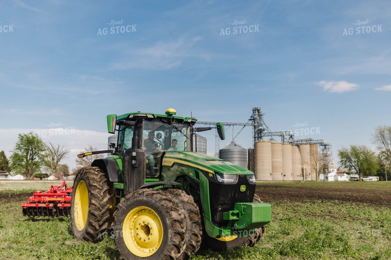 Son in Tractor Cab with Father 115067