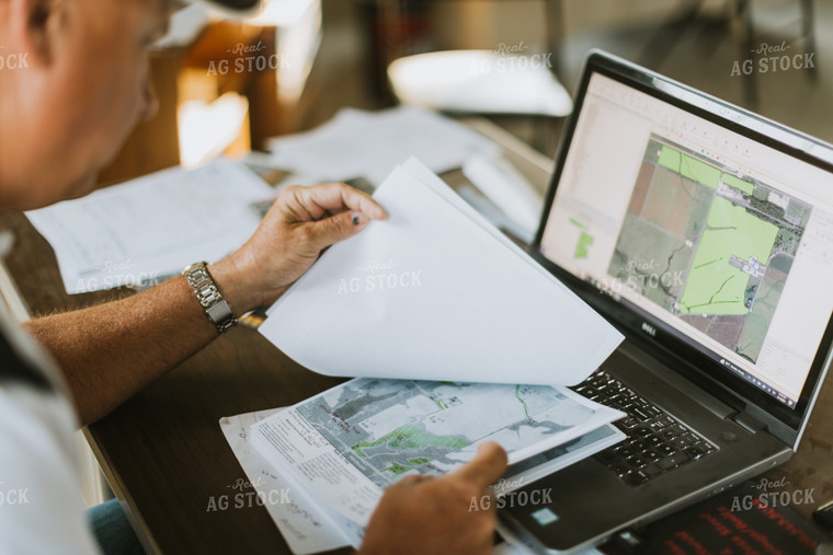 Farmer Working on Computer 7752