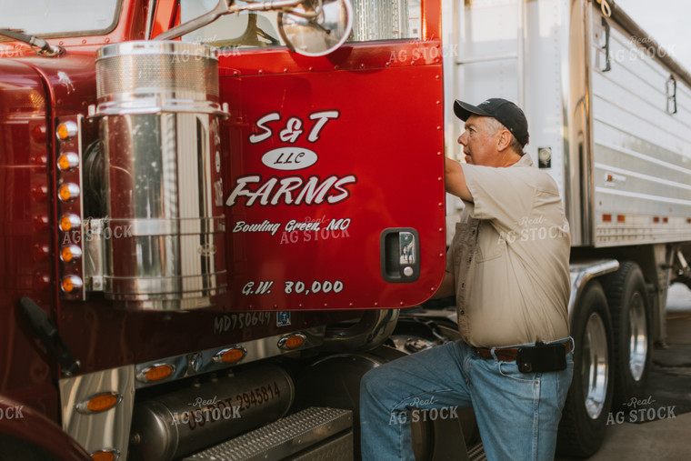 Farmer Climbing Into Semi Truck 7791