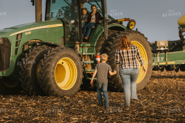 Farmer Walking to Tractor with Kids 8217
