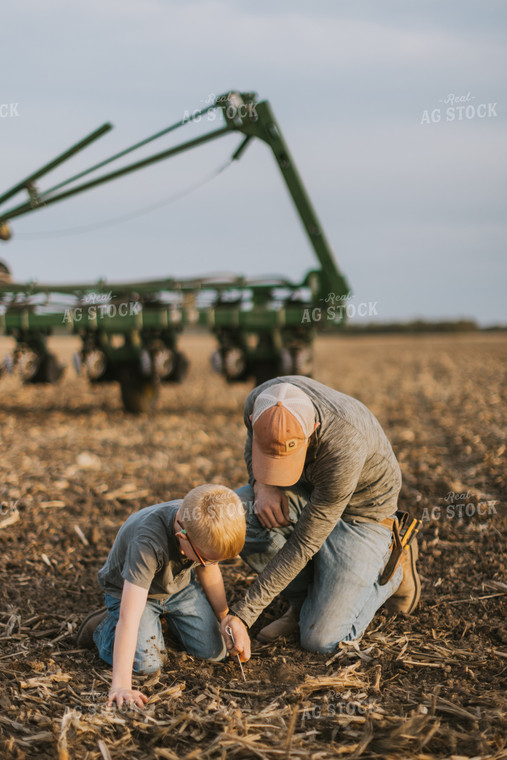 Farmer Checking Seed Depth with Son 8223