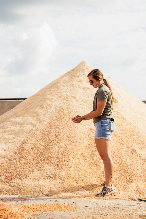 Farmer Handling Feed Ration 67443