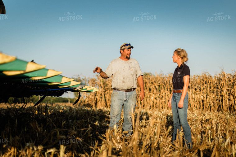 Farmer and Agronomist Talking in Field 8281