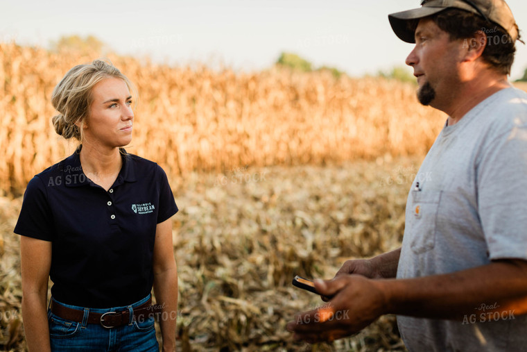 Farmer and Agronomist Talking in Field 8297