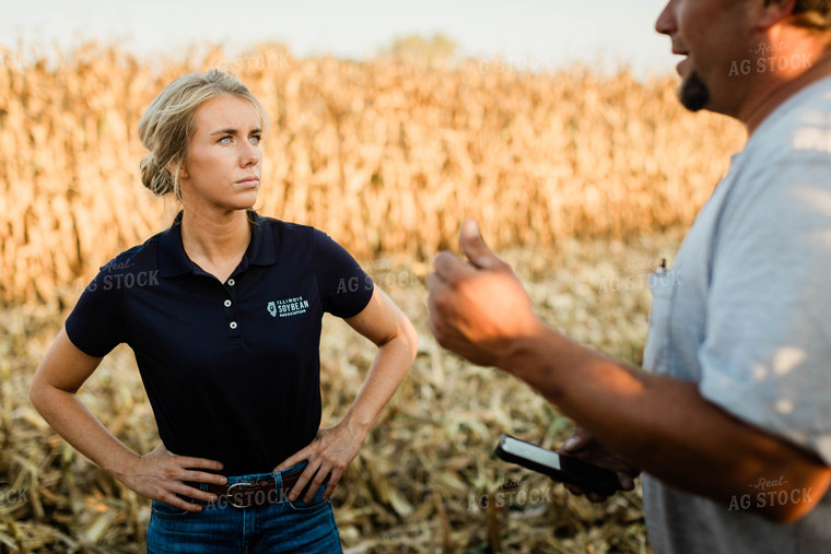 Farmer and Agronomist Talking in Field 8298