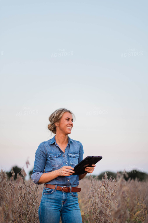 Female Farmer on Tablet in Field 8372