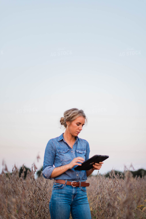 Female Farmer on Tablet in Field 8377