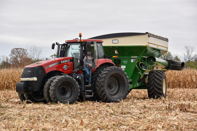 Farmer Climbing out of Tractor 84211