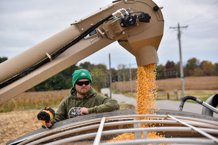 Farmer Watching Truck Fill 84215