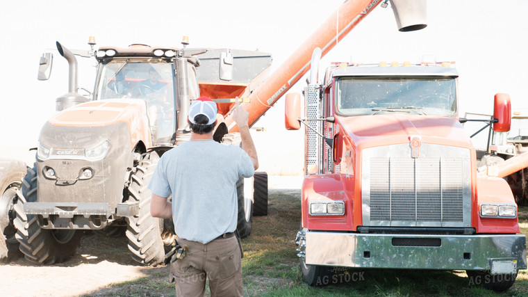 Farmer Guiding Truck Driver 26090