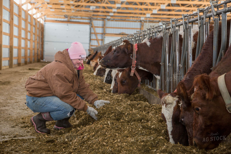 Female Dairy Farmer with Total Mixed Ration 161017