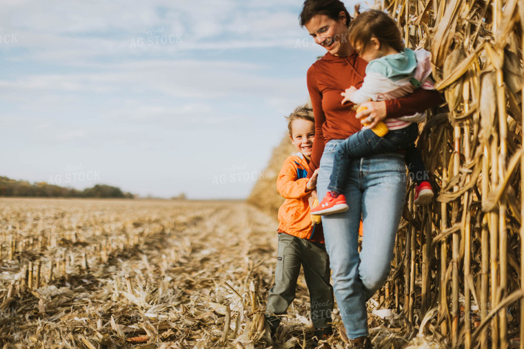 Female Farmer and Kids Playing in Cornfield 8521