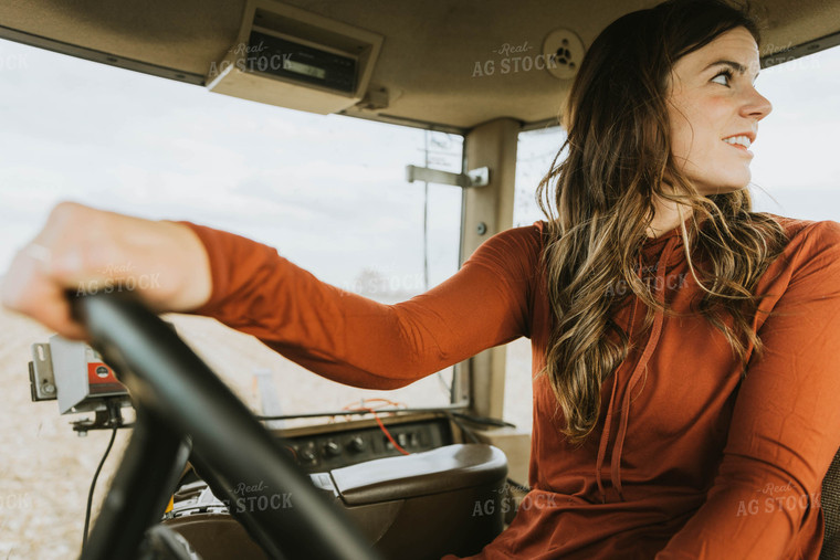 Female Farmer Driving Tractor 8548