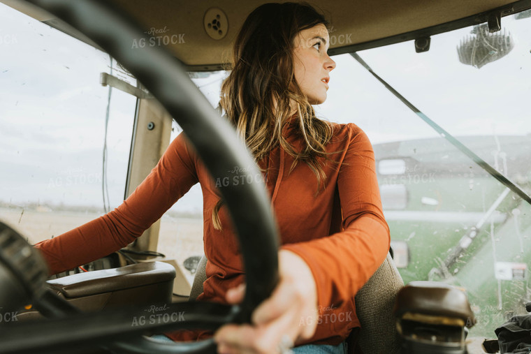 Female Farmer Driving Tractor 8549