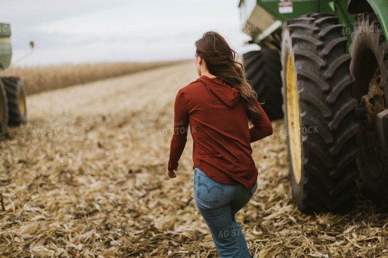 Female Farmer Walking to Combine 8557