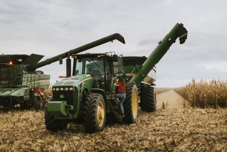 Farmers Climbing out of Harvest Equipment 8585