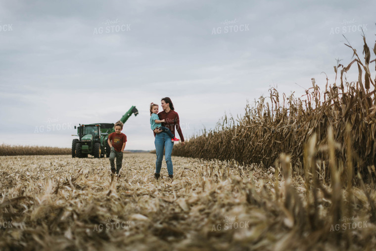 Female Farmer and Kids Walking Away from Tractor 8609