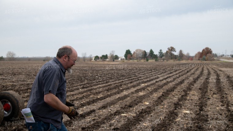 Farmer Walking byTractor 26149