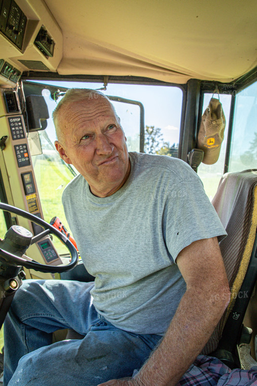 Farmer in Tractor Cab 142014