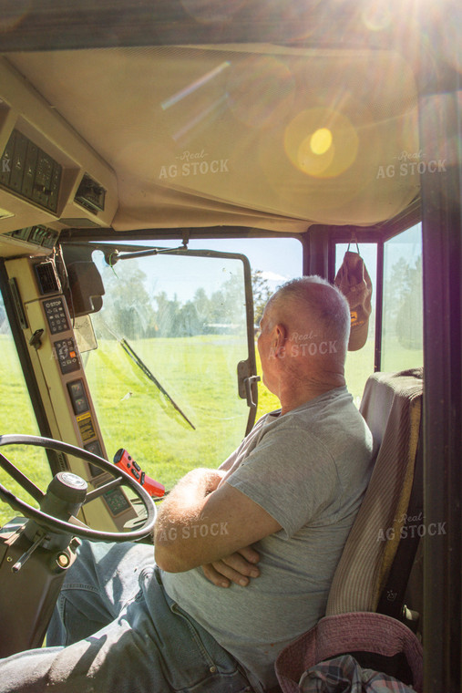 Farmer in Tractor Cab 142016