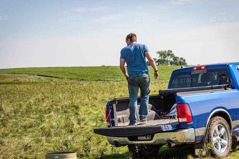 Farmer Unloading Truck Bed 155095