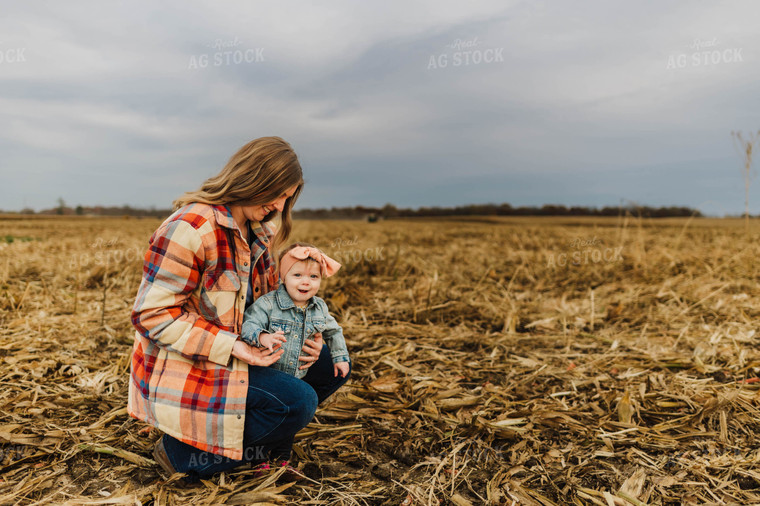 Farm Wife and Kid in Field 115154