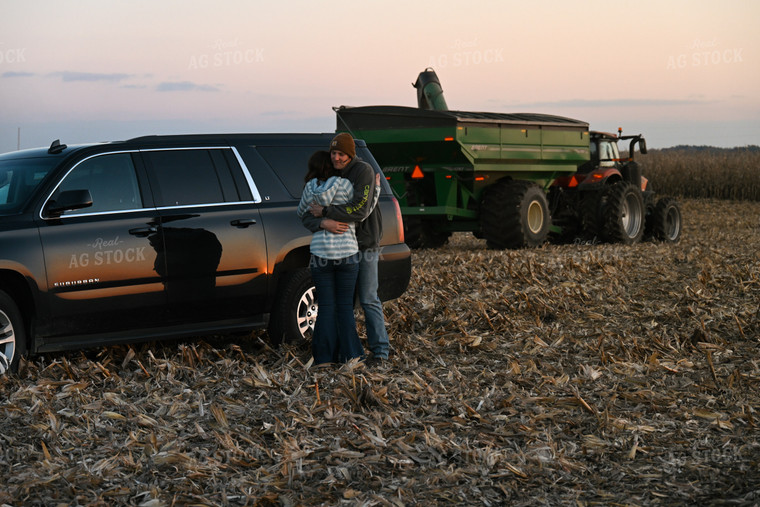 Farmer Hugging Wife in Field 26318