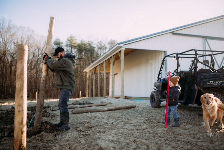 Farm Family Putting up Fence 169052