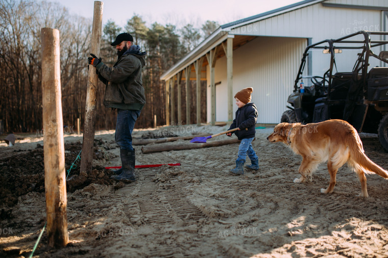 Farm Family Putting up Fence 169053