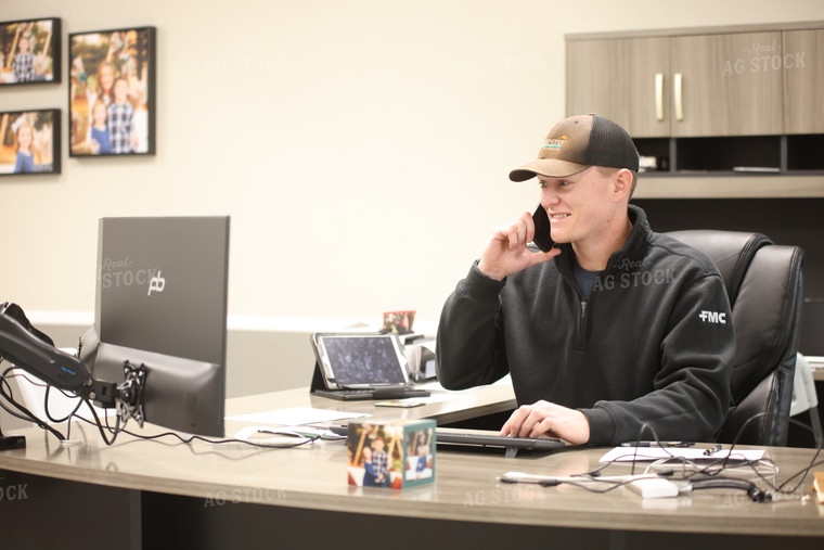 Farmer on Phone in Office 161113