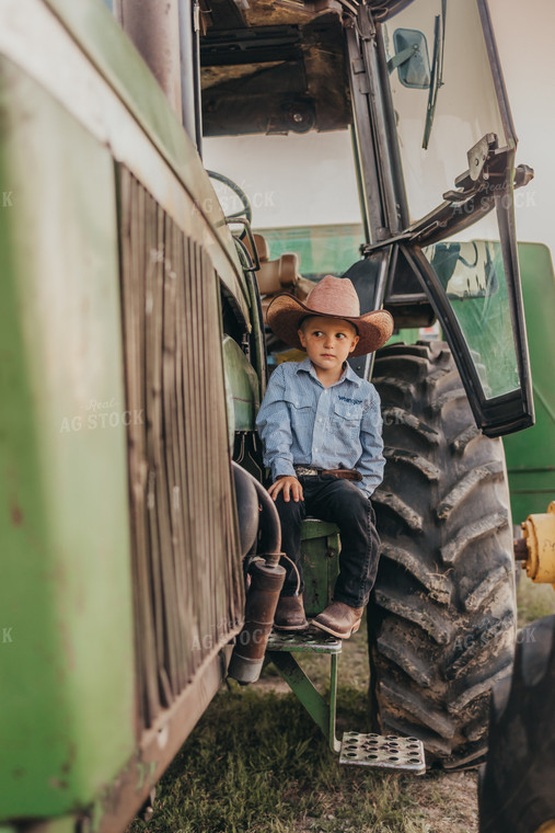 Farm Kid on Tractor Ladder 61144