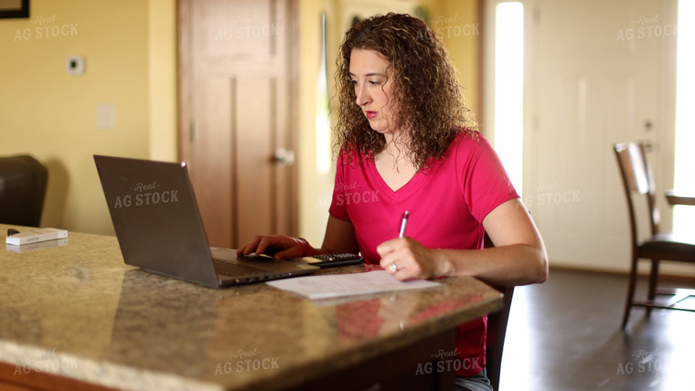 Female Farmer Working on Computer 8702